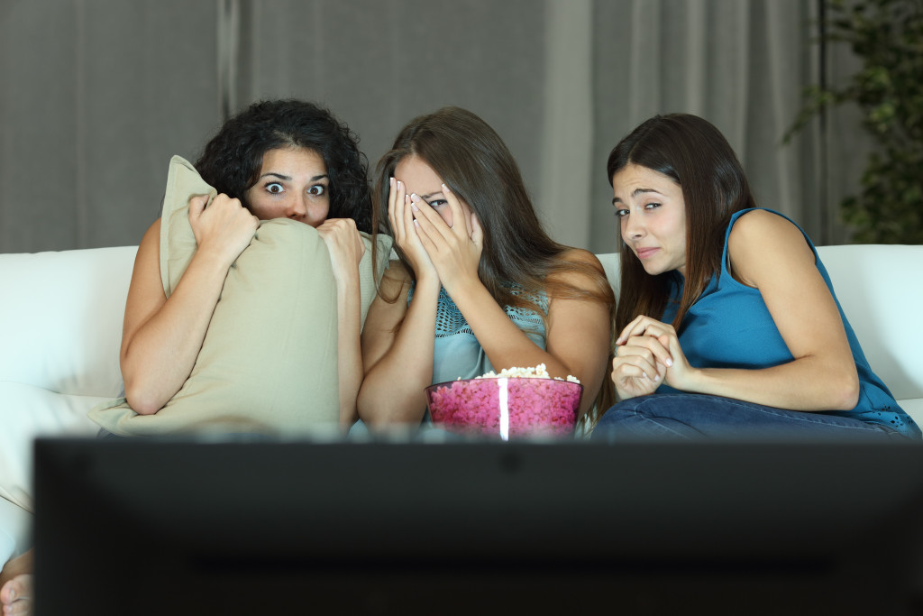 Friends watching a horror movie